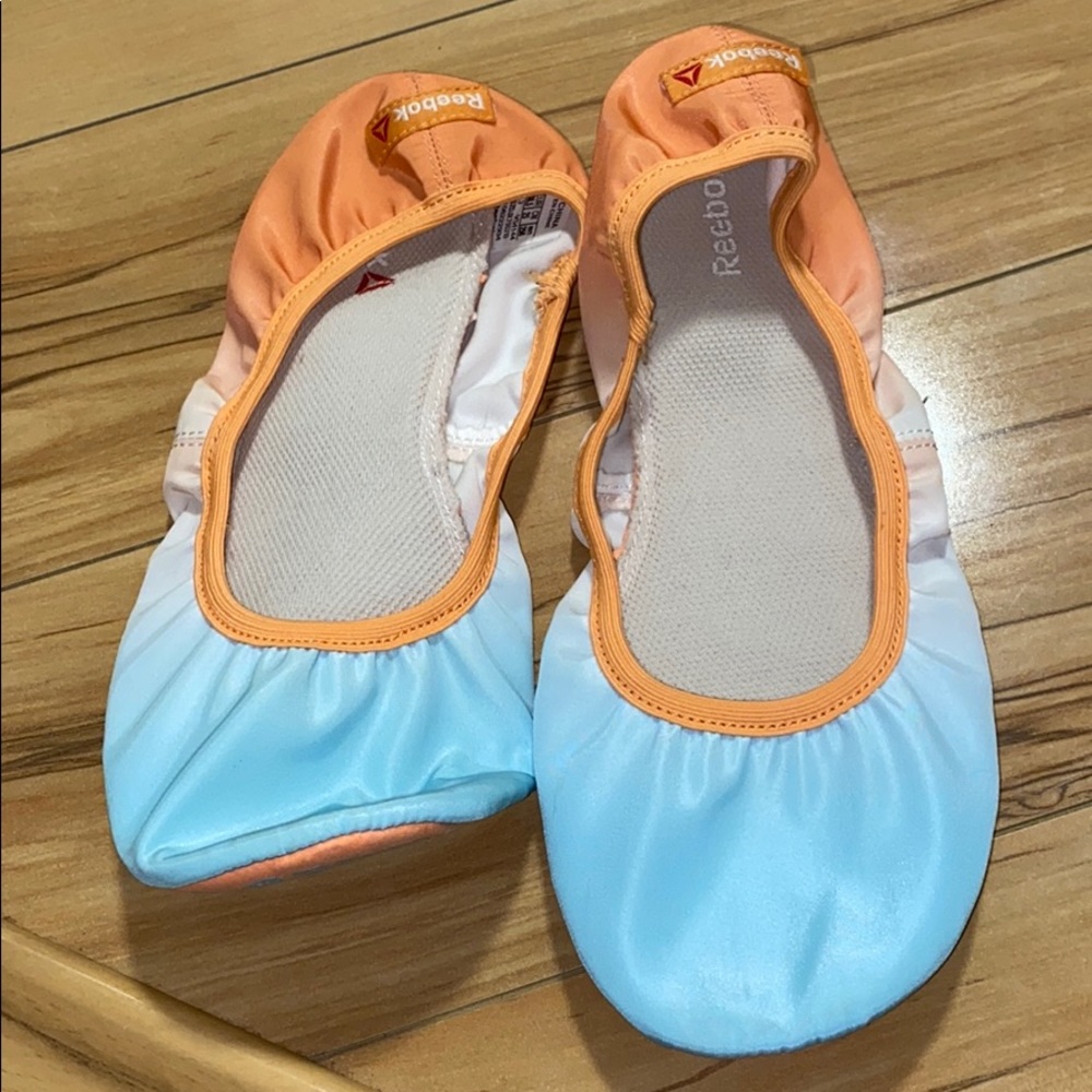 REEBOK SLIPPERS WORN ONCE. PRICE FIRM!